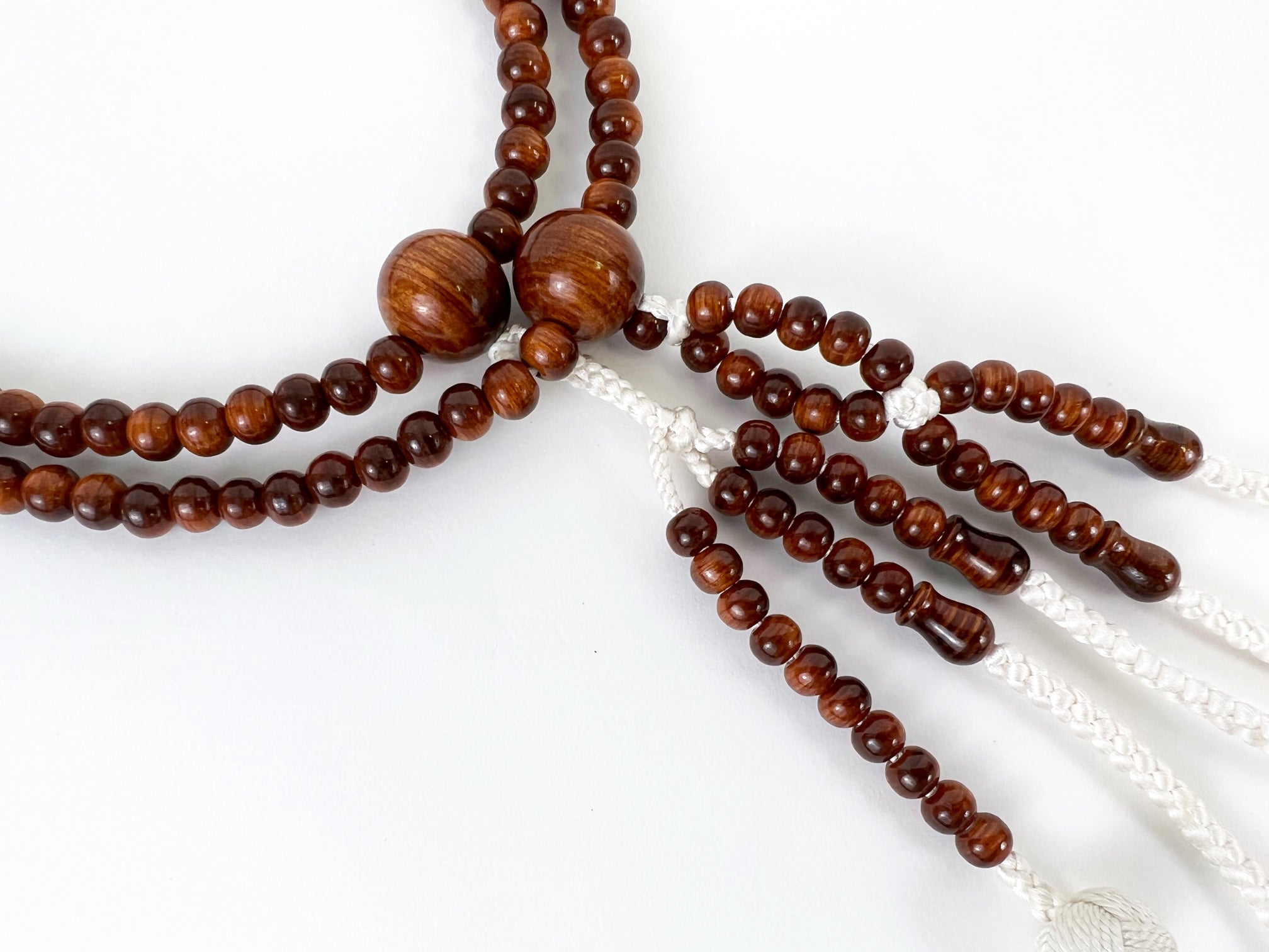 Tsuishu (Camphorwood) Beads with Knitted Tassels